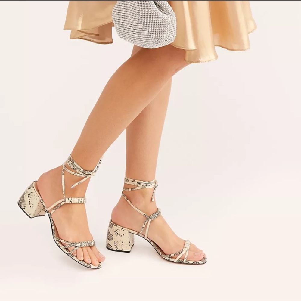 Strapy snake skin print heel